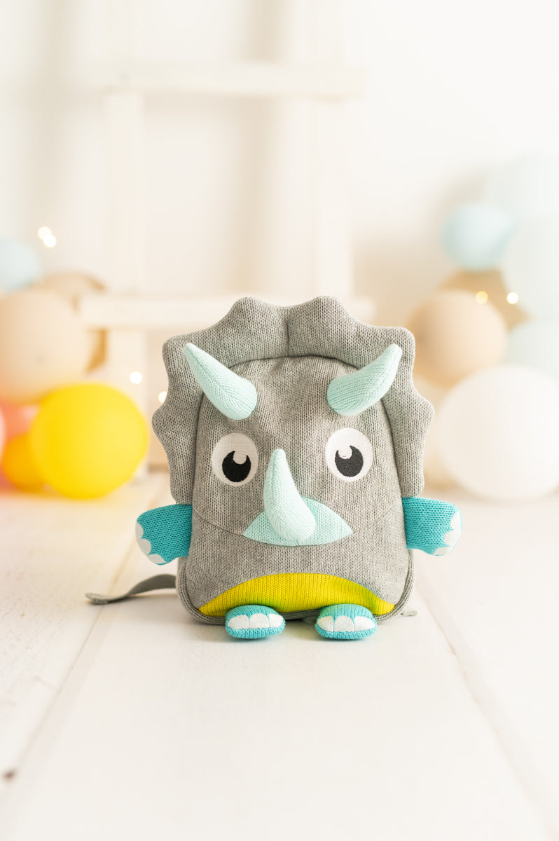 Backpack with a rhino design on a light background