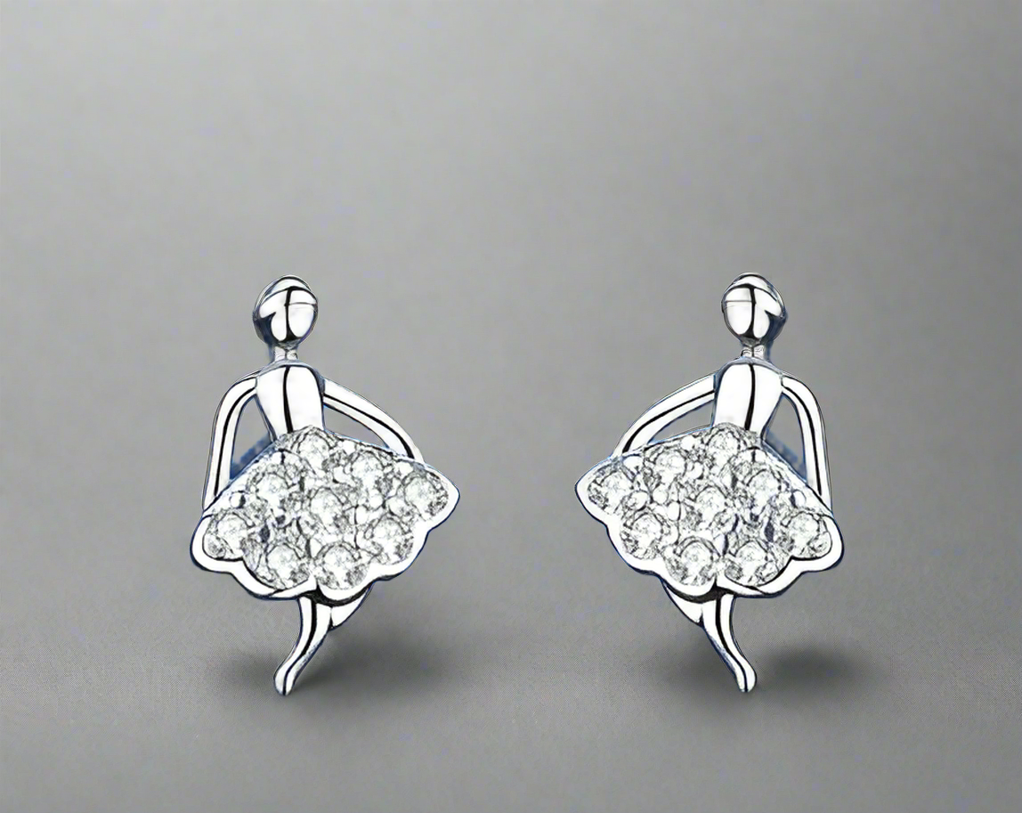A pair of sterling silver stud earrings featuring a ballerina design with a floral pattern.